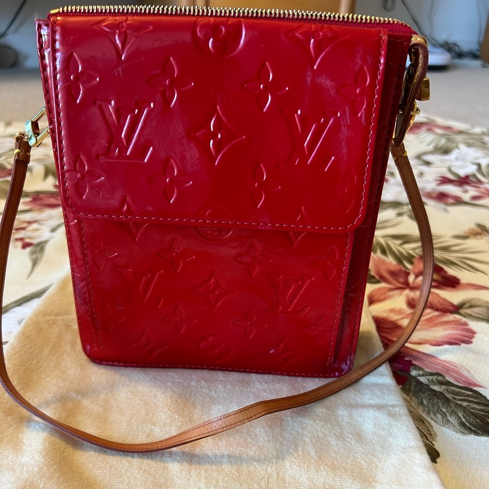 Louis Vuitton. 💯 authentic. Bright red. Limited edition. 7”H. 6.5”W